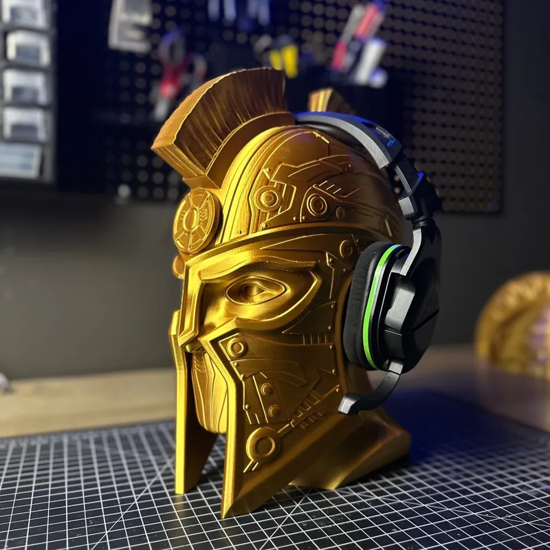 Gold 3D printed Spartan helmet headphone stand with gaming headset