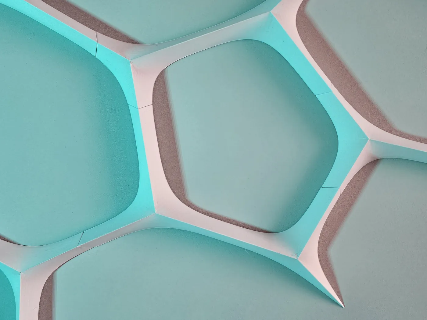 3D printed organic cell-pattern wall tiles with teal glow